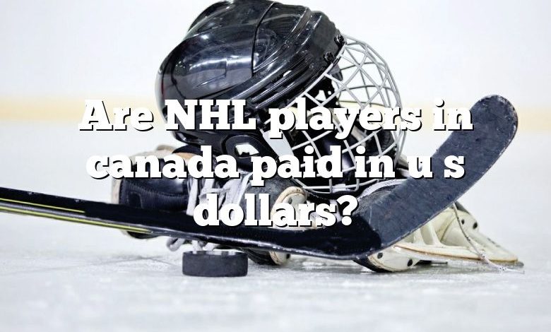 Are NHL players in canada paid in u s dollars?