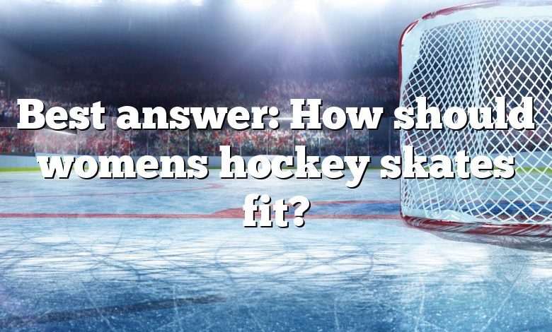 Best answer: How should womens hockey skates fit?