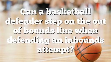 Can a basketball defender step on the out of bounds line when defending an inbounds attempt?