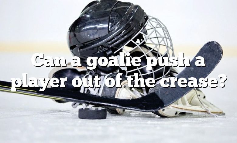 Can a goalie push a player out of the crease?