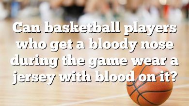 Can basketball players who get a bloody nose during the game wear a jersey with blood on it?