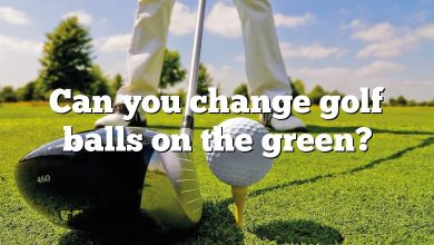 Can you change golf balls on the green?