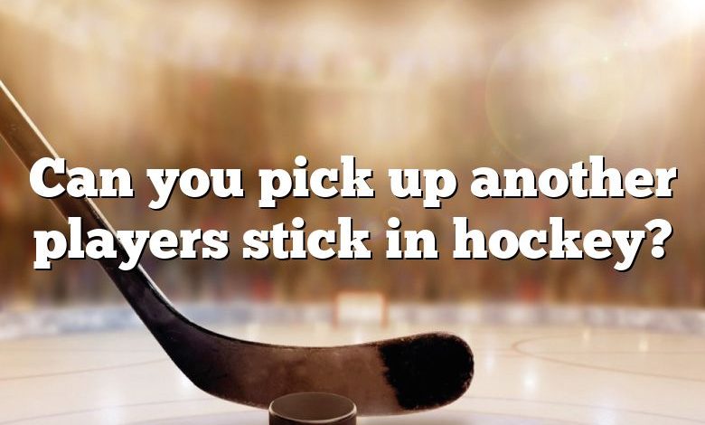 Can you pick up another players stick in hockey?