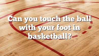 Can you touch the ball with your foot in basketball?