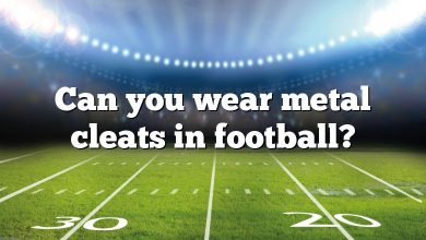 Can you wear metal cleats in football?