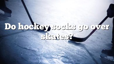 Do hockey socks go over skates?