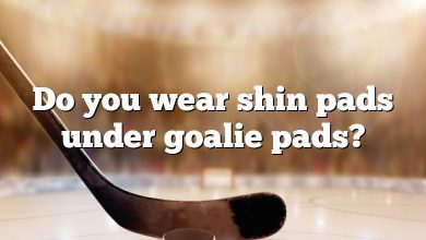 Do you wear shin pads under goalie pads?