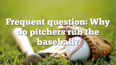 Frequent question: Why do pitchers rub the baseball?