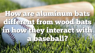 How are aluminum bats different from wood bats in how they interact with a baseball?