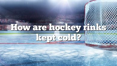 How are hockey rinks kept cold?