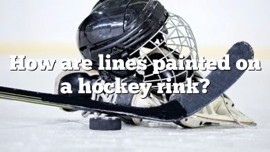 How are lines painted on a hockey rink?