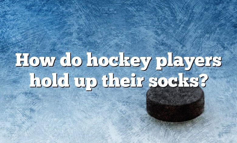 How do hockey players hold up their socks?