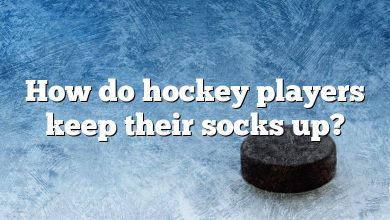 How do hockey players keep their socks up?