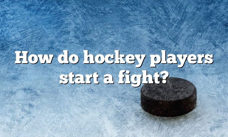 How do hockey players start a fight?