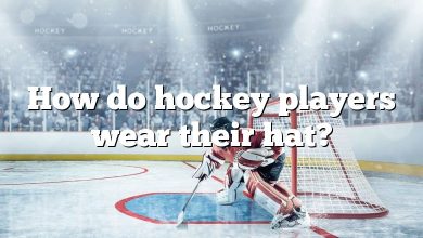 How do hockey players wear their hat?