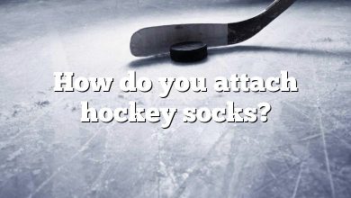 How do you attach hockey socks?