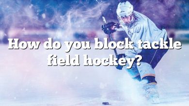 How do you block tackle field hockey?