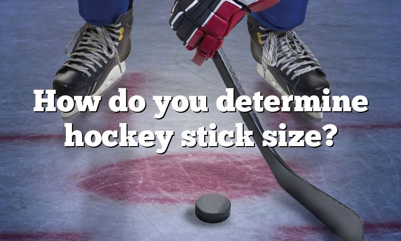 How do you determine hockey stick size?