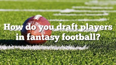 How do you draft players in fantasy football?
