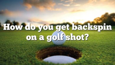 How do you get backspin on a golf shot?
