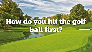 How do you hit the golf ball first?