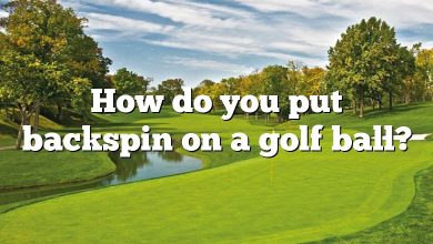 How do you put backspin on a golf ball?