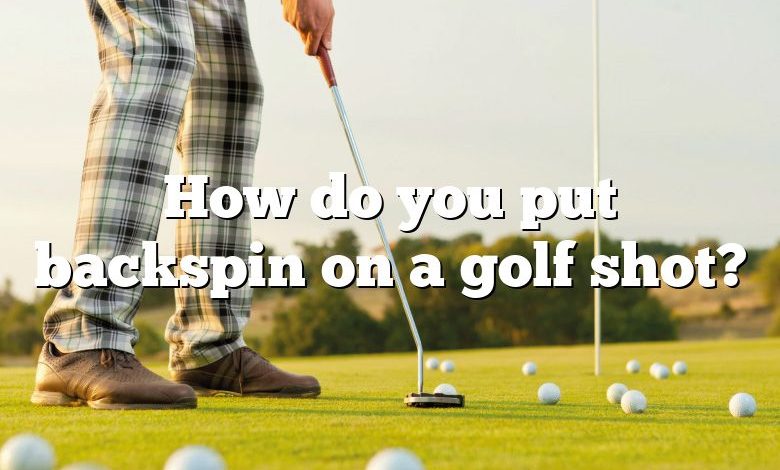 How do you put backspin on a golf shot?