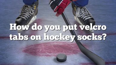 How do you put velcro tabs on hockey socks?