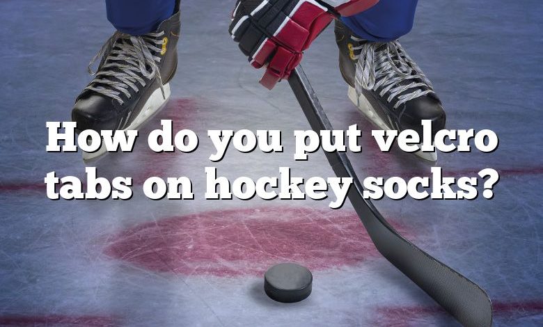 How do you put velcro tabs on hockey socks?