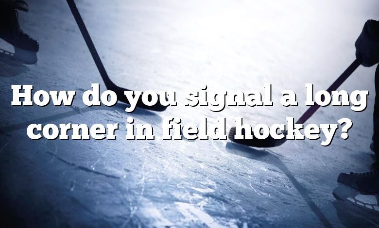 How do you signal a long corner in field hockey?