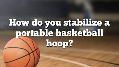 How do you stabilize a portable basketball hoop?