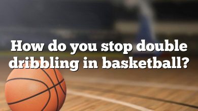 How do you stop double dribbling in basketball?