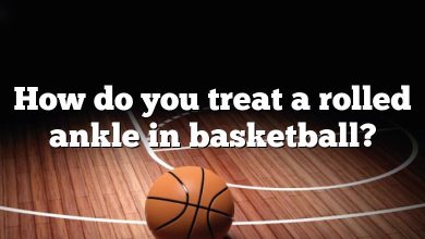 How do you treat a rolled ankle in basketball?