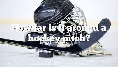 How far is it around a hockey pitch?