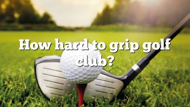 How hard to grip golf club?