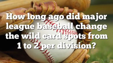 How long ago did major league baseball change the wild card spots from 1 to 2 per division?
