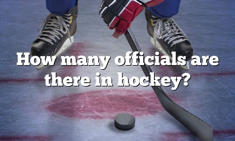 How many officials are there in hockey?