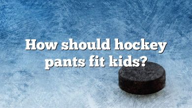 How should hockey pants fit kids?
