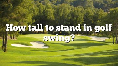 How tall to stand in golf swing?