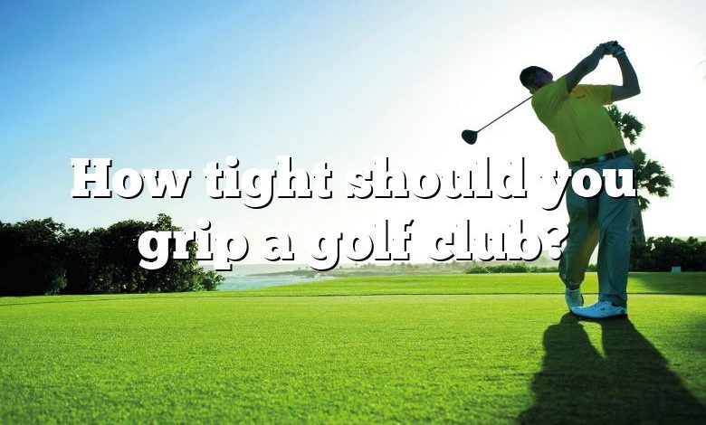 How tight should you grip a golf club?
