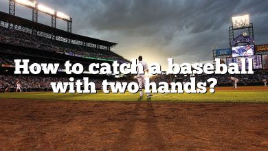 How to catch a baseball with two hands?