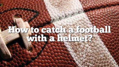 How to catch a football with a helmet?