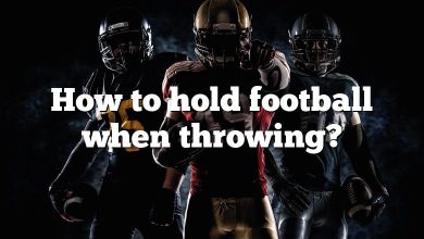 How to hold football when throwing?