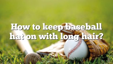 How to keep baseball hat on with long hair?