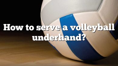 How to serve a volleyball underhand?