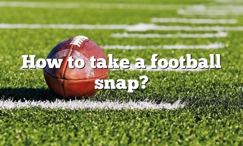 How to take a football snap?
