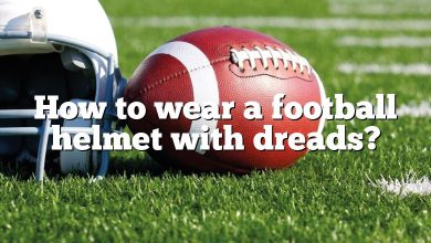 How to wear a football helmet with dreads?