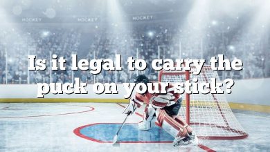 Is it legal to carry the puck on your stick?