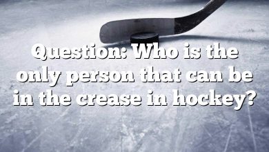 Question: Who is the only person that can be in the crease in hockey?