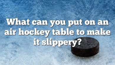 What can you put on an air hockey table to make it slippery?